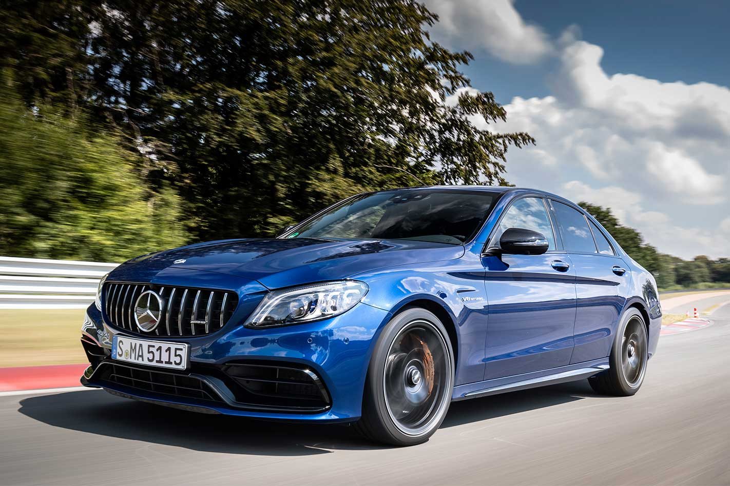 Blue Mercedes-AMG C 63 on country road
