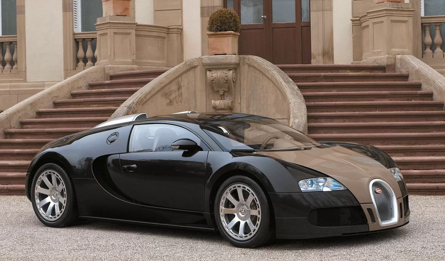 Bugatti Veyron Fbg par Hermes parked outside mansion