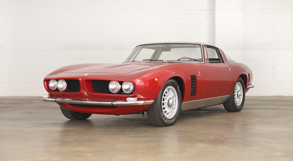 Red Iso Grifo parked in garage